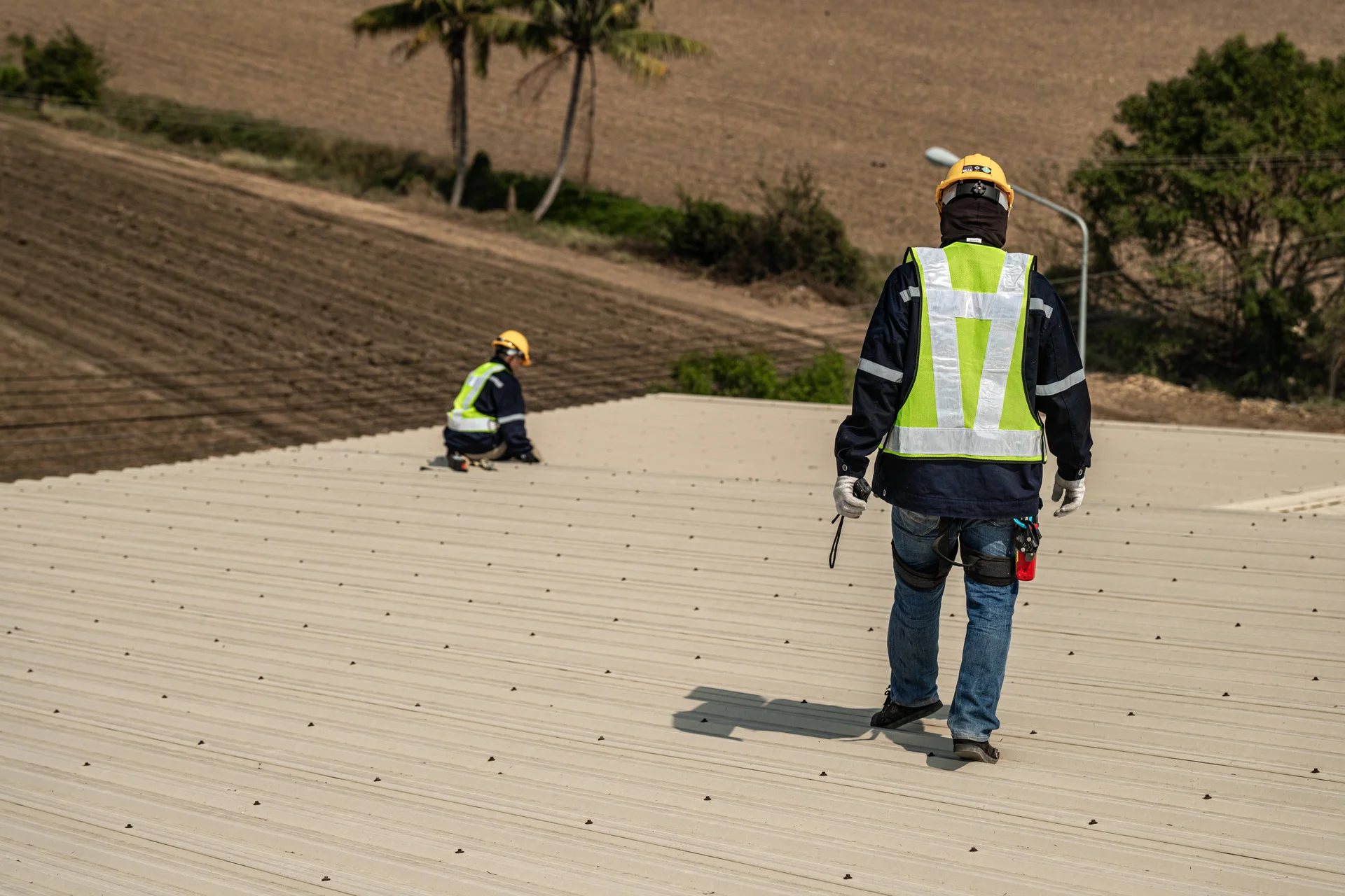 Brandon J Roofing professionals preparing a roof for winter
