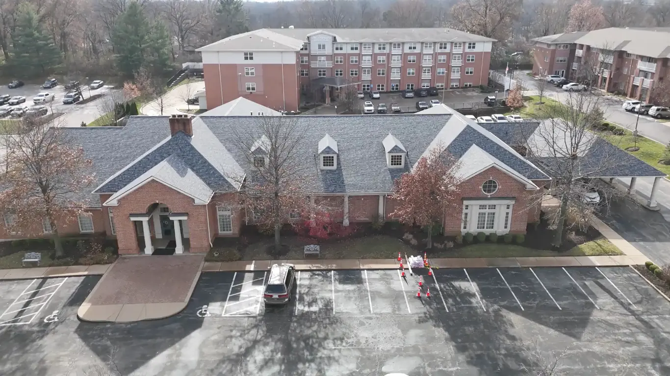 House roof after replacement — new shingles installed