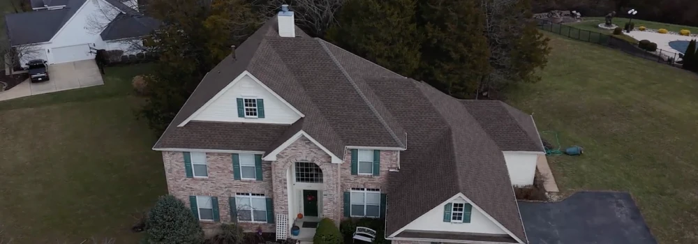 Roof after replacement — new shingles installed